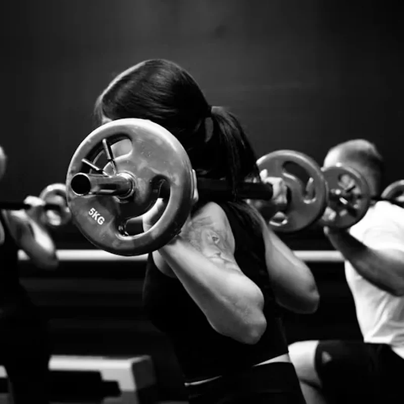 Group barbell training session